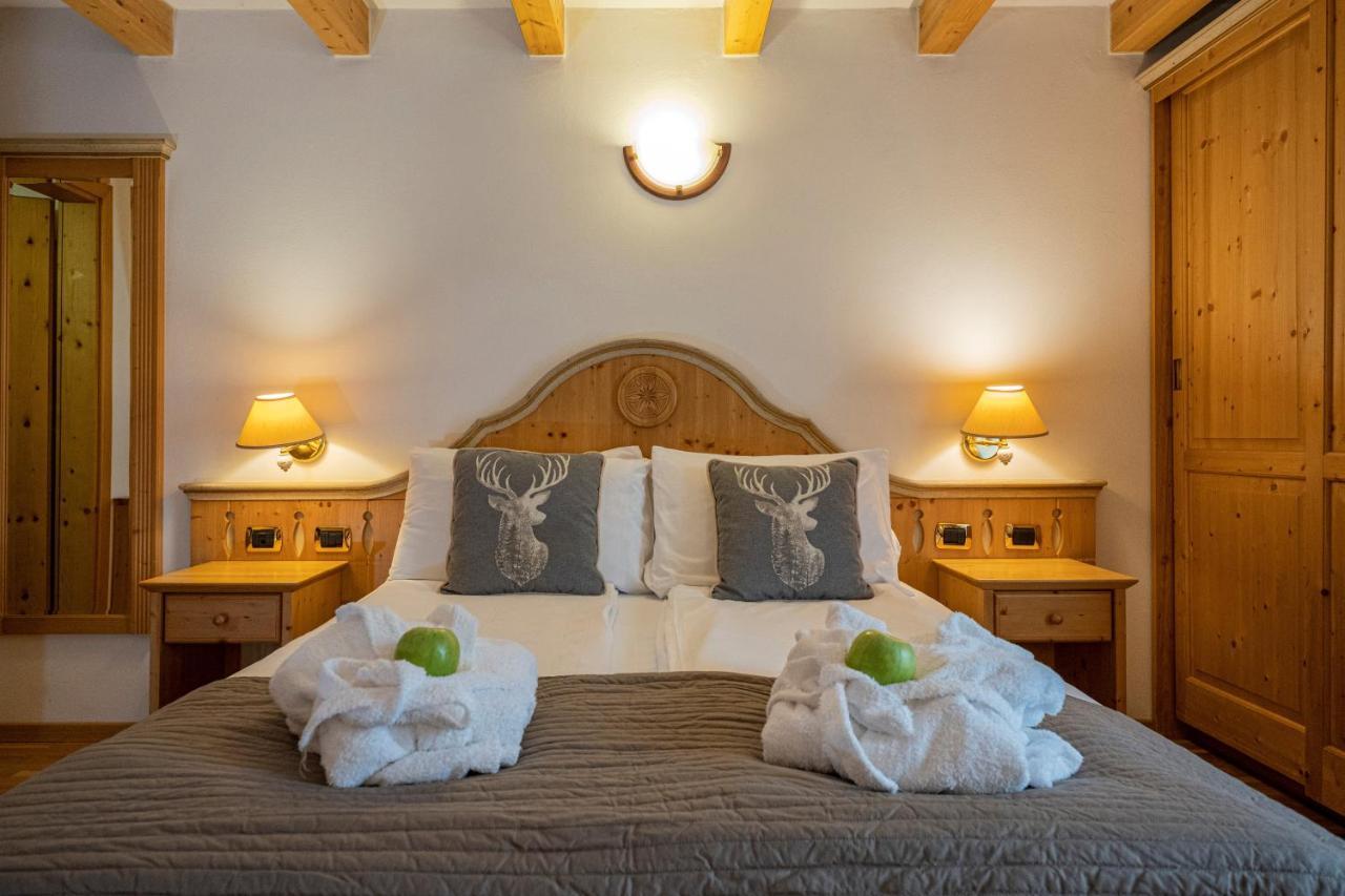 Hotel Soreghes Gran Chalet Campitello di Fassa Bagian luar foto