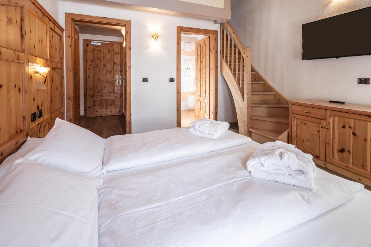Hotel Soreghes Gran Chalet Campitello di Fassa Bagian luar foto